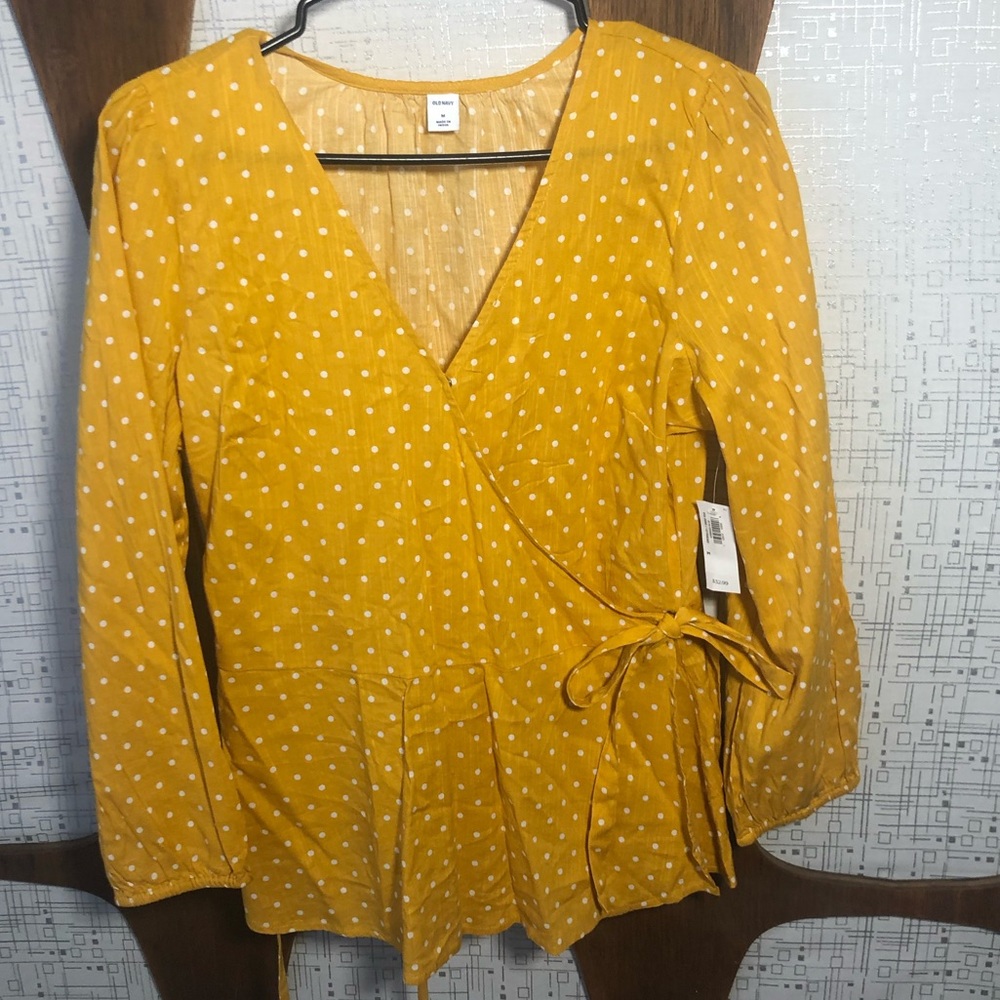 New with tags!  Old Navy peplum wrap top.